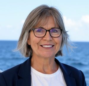 Image of Arlene Haessler with water in the background